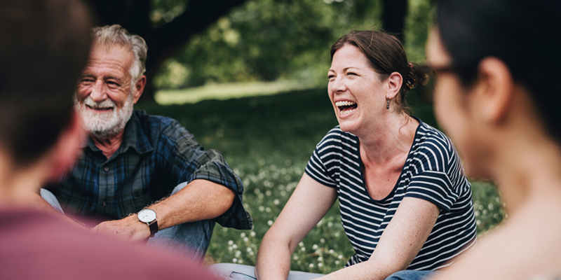 Interventions - Cheerful,Woman,In,The,Park,With,Her,Friends